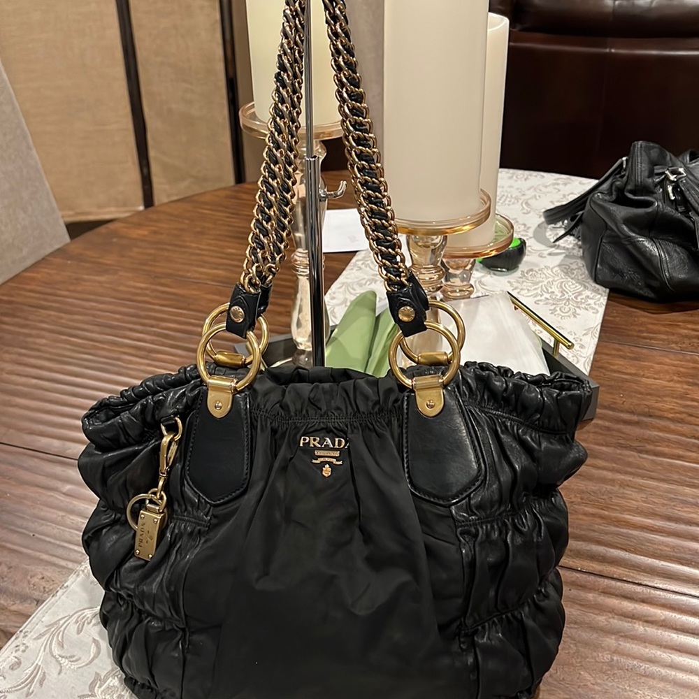 Prada black nylon and leather with gold hardware medium